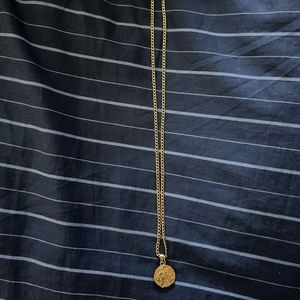 Gold Curb Chain with lion pendant